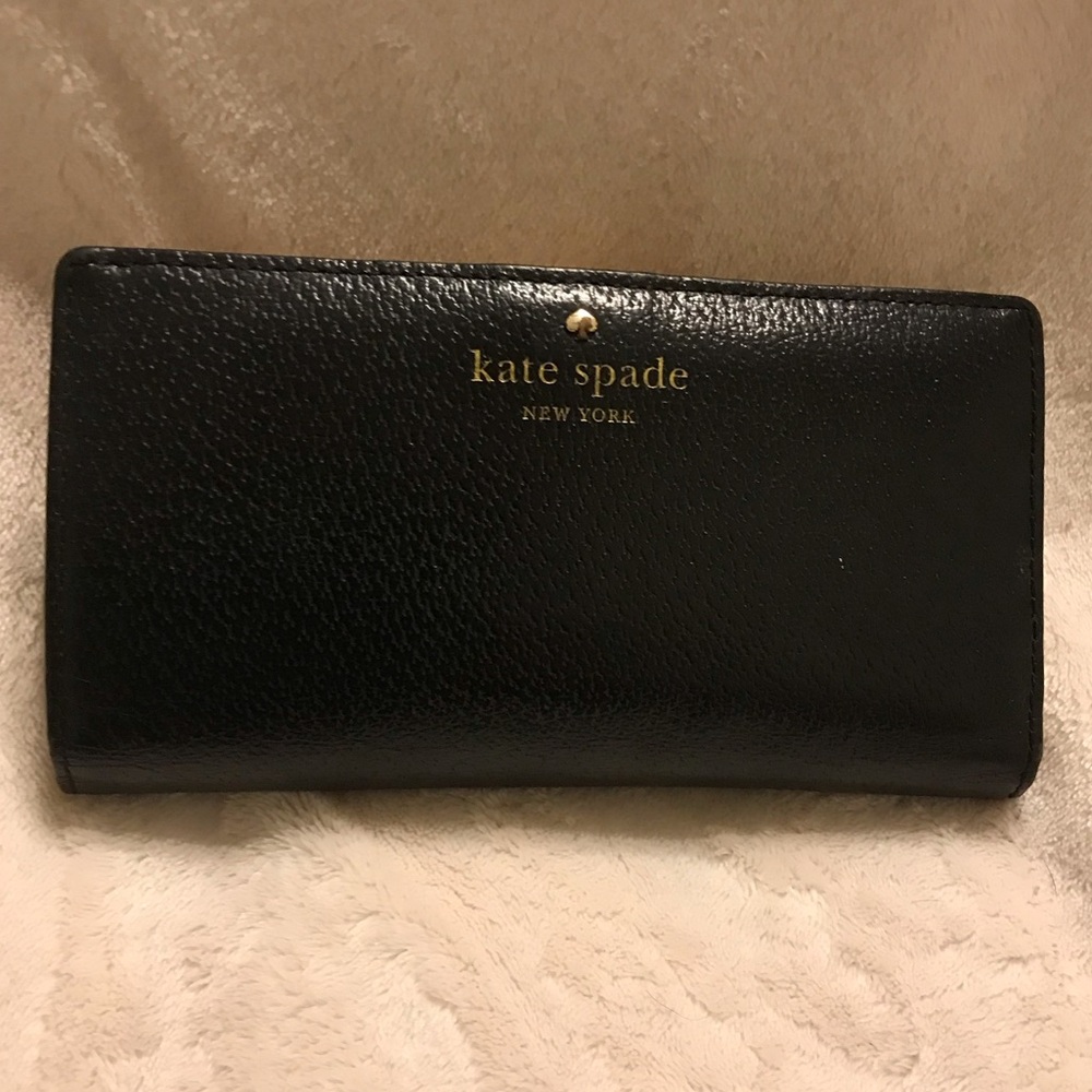Kate Spade large black slim bifold wallet. NEW $70 *some wear shown in photos*